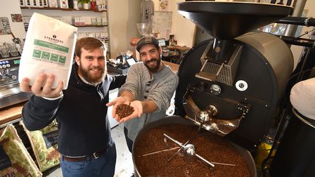 Two of the Maddock brothers with their bean roaster